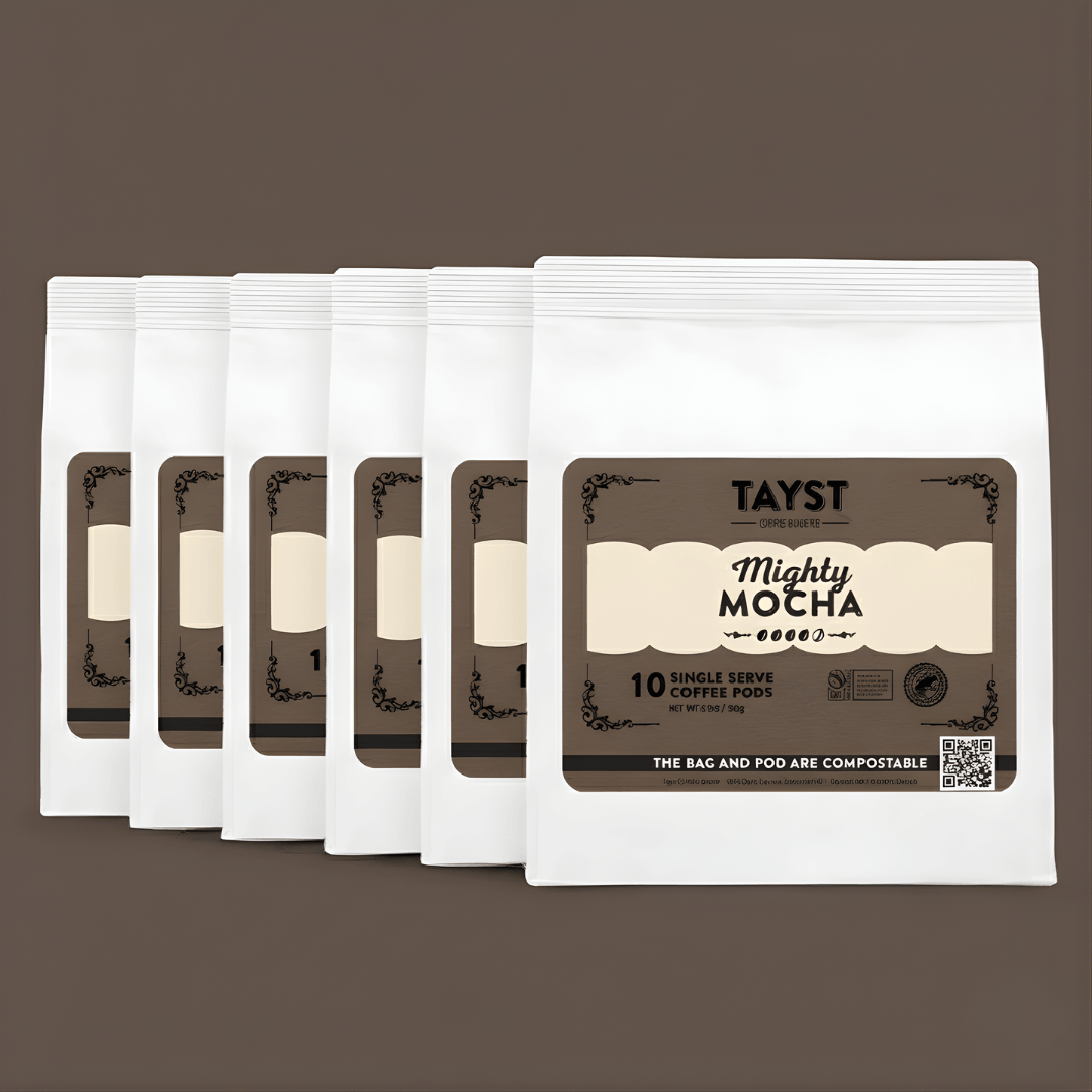 Pack of Tayst Mighty Mocha coffee pods on a brown background