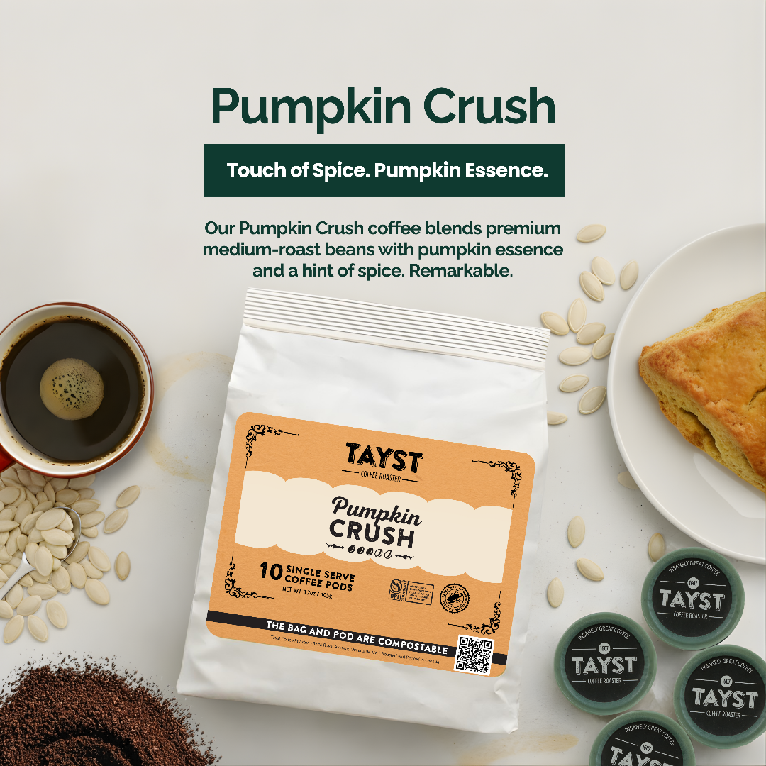 TAYST Pumpkin Crush coffee package with pumpkin seeds, a cup of coffee, and a pastry on a light background.