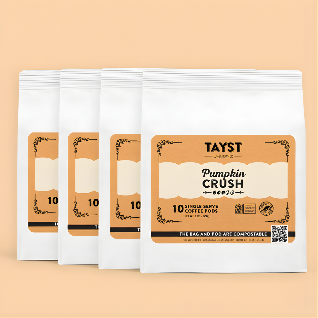 Pack of Tayst Pumpkin Crush single serve coffee pods on a beige background