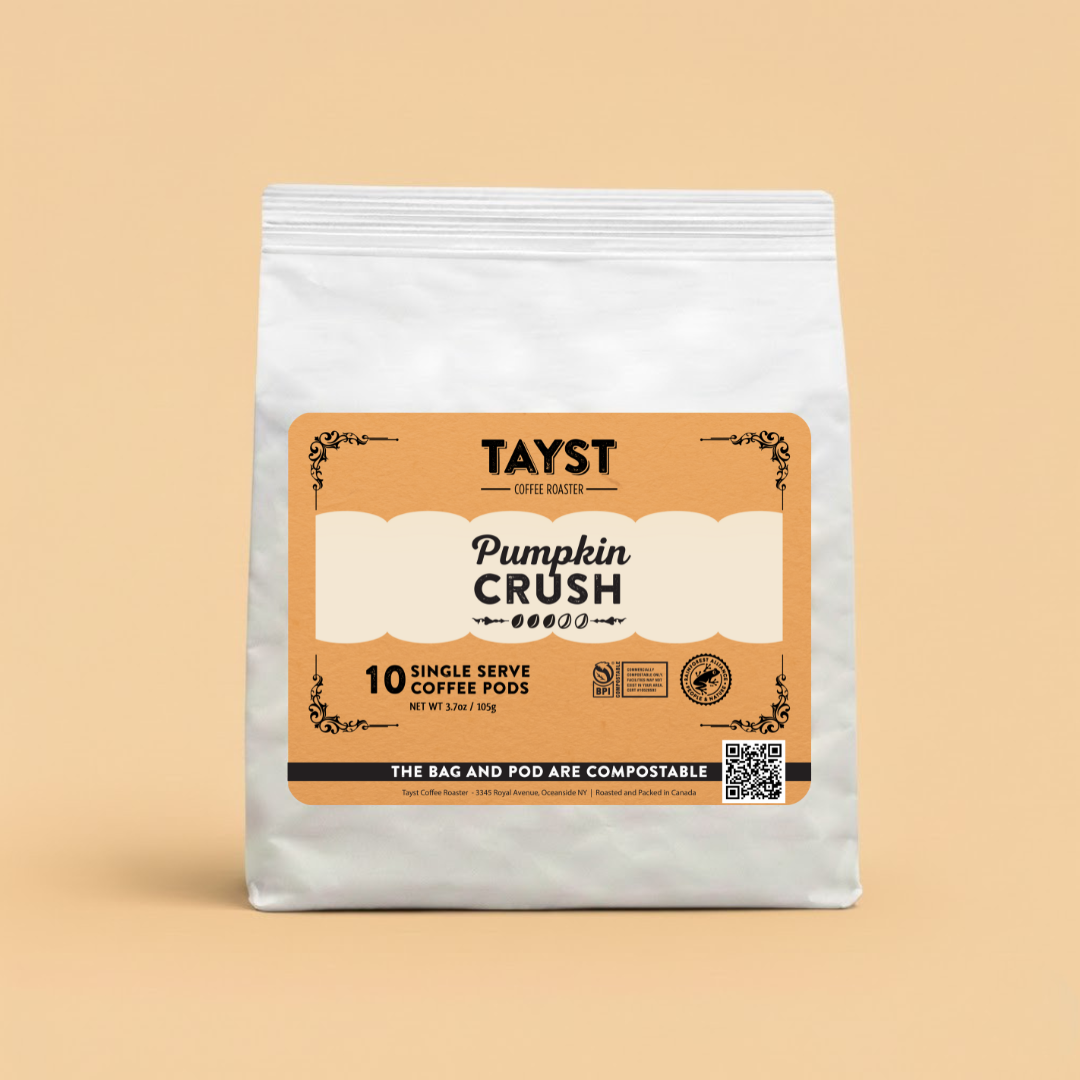 Tayst Pumpkin Crush coffee package on a beige background