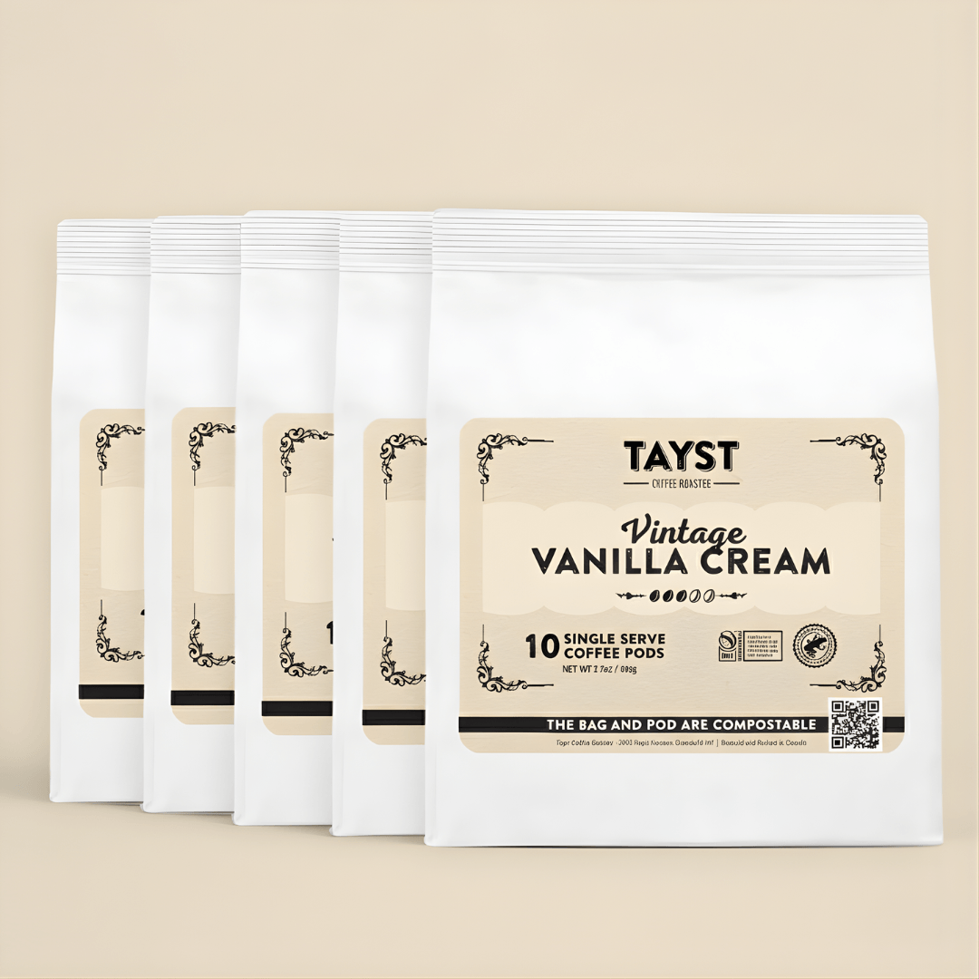 Pack of Tayst Vintage Vanilla Cream coffee pods on a beige background