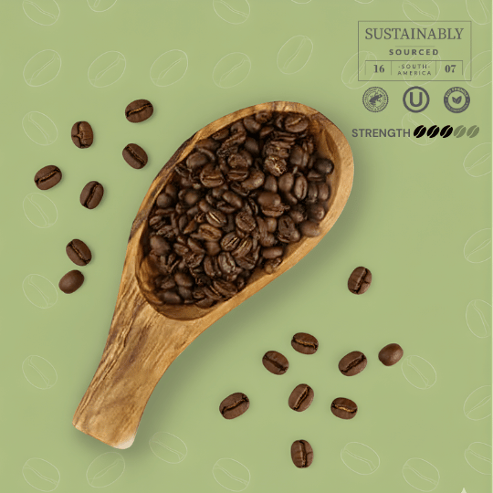 Wooden scoop filled with half caffeine coffee beans on a green background with coffee bean patterns.